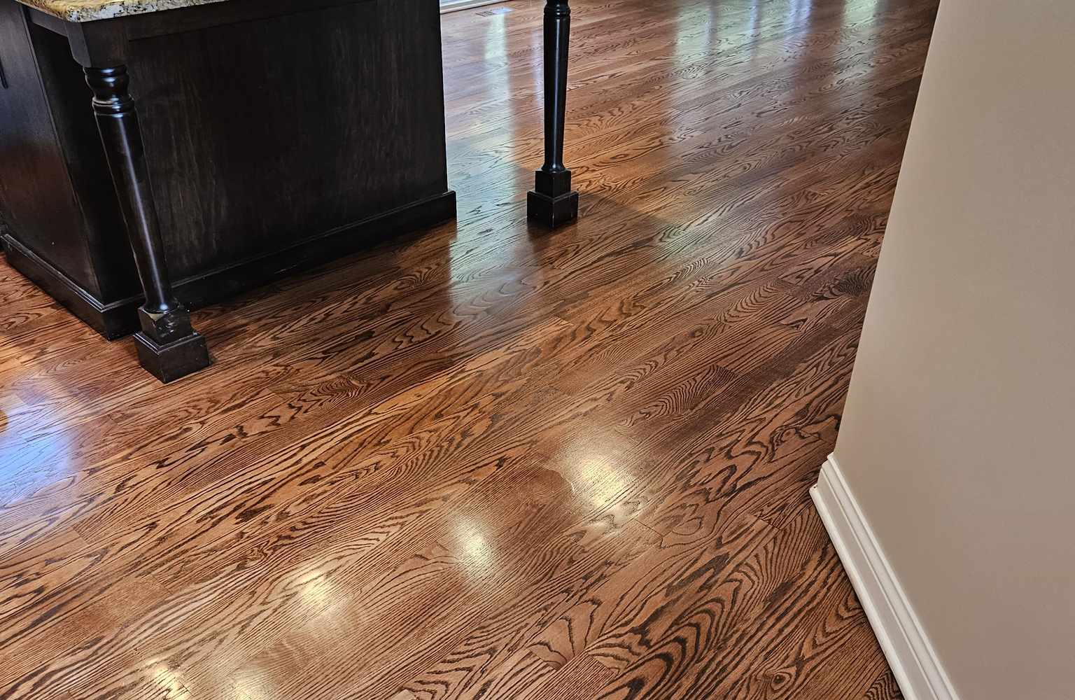 new hardwood floor installation in a kitchen