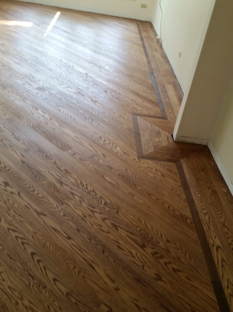 walnut border hardwood floor installed in bloomingdale 03